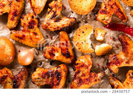 roasted chicken wings with spices, top view roasted chicken wings with spices, top view 28430757