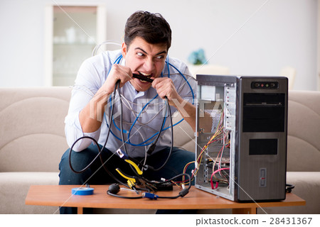 The frustrated man with broken pc computer The frustrated man with broken pc computer 28431367