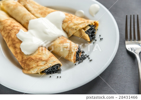 Crepes with black caviar Crepes with black caviar 28431466