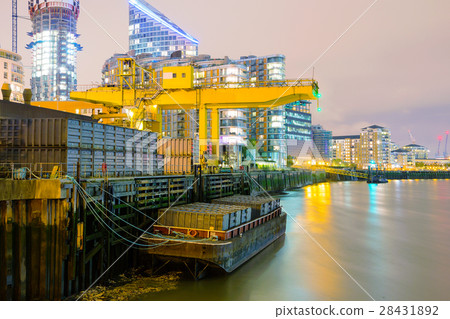 Saint Katherine docks at night with River Thames 28431892