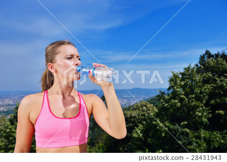 Portrait Of Young Woman Drinking Water After Portrait Of Young Woman Drinking Water After 28431943