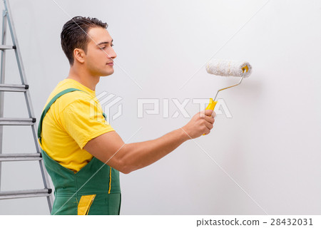 The man painting the wall in diy concept The man painting the wall in diy concept 28432031
