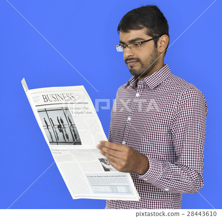 Indian Man Reading Newspaper Concept Indian Man Reading Newspaper Concept 28443610