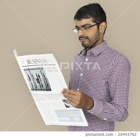 Indian Man Reading Newspaper Concept Indian Man Reading Newspaper Concept 28443762