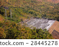 Electric generator field on green hill 28445278