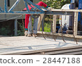 Worker placing cement floor in construction site 28447188
