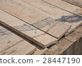 Worker placing cement floor in construction site 28447190
