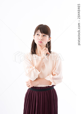A young woman, office casual thinks A young woman, office casual thinks 28448465