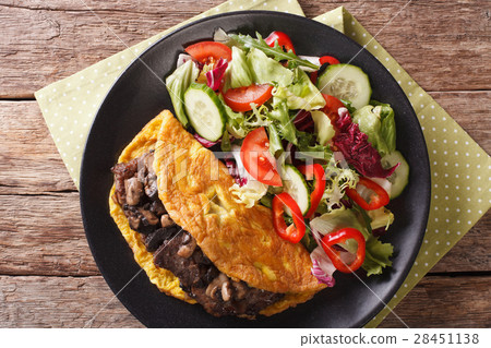 Austrian cutlet with mushrooms, scrambled eggs 28451138