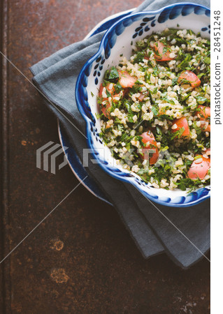 Vegetarian salad with bulgur, mint, tomato 28451248