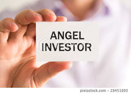 Businessman holding card with text ANGEL INVESTOR 28451893