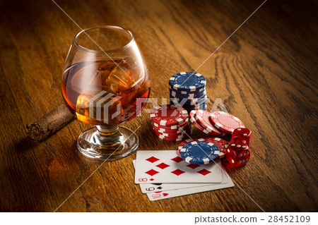 Cigar, chips for gamblings, drink and playing 28452109