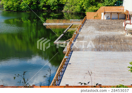 Wooden relaxing area on the sovata lake 28453037