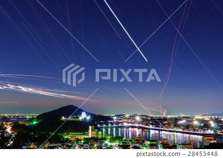 Night view of Inuyama and light trace of fighter aircraft 28453448
