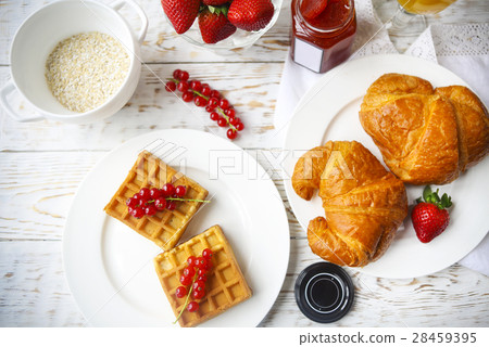 Waffles with red currant jam berries croissants 28459395