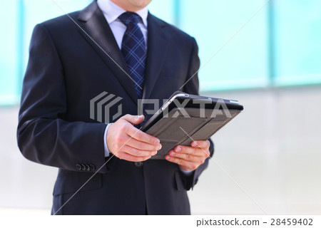 Businessman with a tablet PC 28459402
