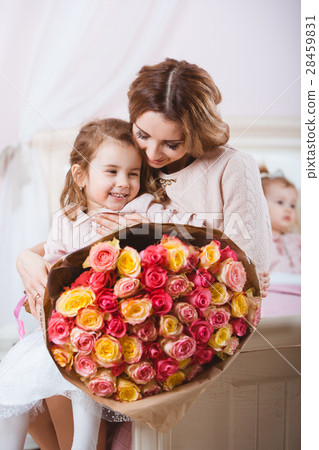 Smiling mother with daughter portrait 28459831