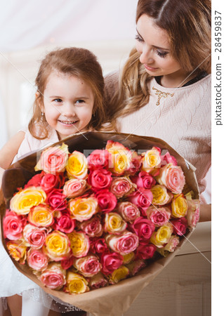 Smiling mother with daughter portrait 28459837