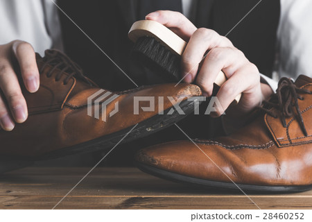 Men who take care of leather shoes Men who take care of leather shoes 28460252