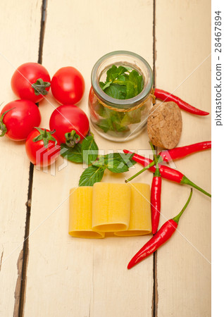 Italian pasta paccheri with tomato mint and chili  28467894
