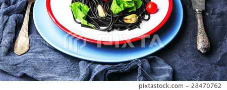 black pasta with mussels and trout black pasta with mussels and trout 28470762