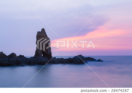 Rock on seacoast skyline Rock on seacoast skyline 28474287