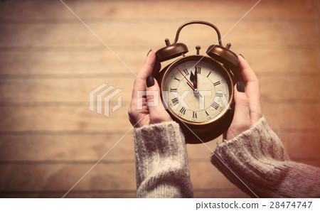 hands holding clock hands holding clock 28474747