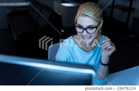 Joyful IT woman enjoying successful results at 28476124