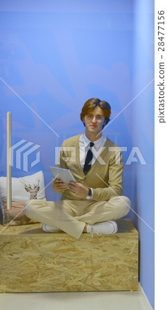 Young Hipster working Laptop modern Interior Young Hipster working Laptop modern Interior 28477156