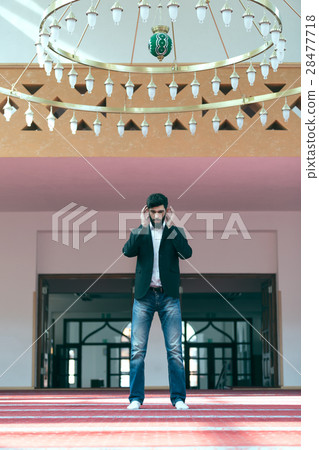Young beautiful Muslim Man Praying In Mosque 28477718