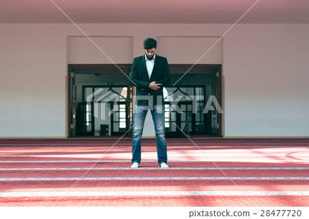 Young beautiful Muslim Man Praying In Mosque 28477720