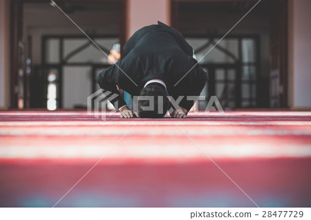 Young beautiful Muslim Man Praying In Mosque 28477729