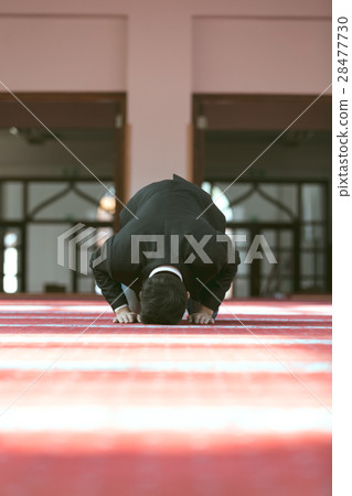 Young beautiful Muslim Man Praying In Mosque 28477730