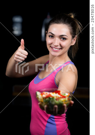 healthy young woman eating vegetables green salad healthy young woman eating vegetables green salad 28478016