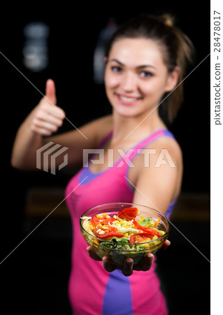healthy young woman eating vegetables green salad healthy young woman eating vegetables green salad 28478017