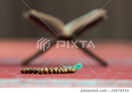 Quran - holy book of Muslims, in the mosque Quran - holy book of Muslims, in the mosque 28478554