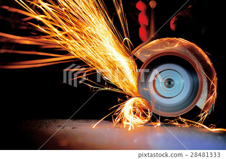 Worker cutting metal with grinder Worker cutting metal with grinder 28481333