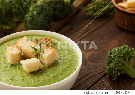 Ready cream - soup with broccoli in white bowl 28482075