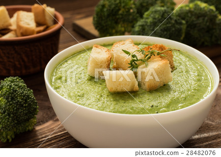 Ready cream - soup with broccoli in white bowl Ready cream - soup with broccoli in white bowl 28482076
