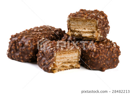 chocolate candy with nuts isolated on white chocolate candy with nuts isolated on white 28482213