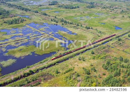 Aerial view of bog landscape and train with turf 28482596