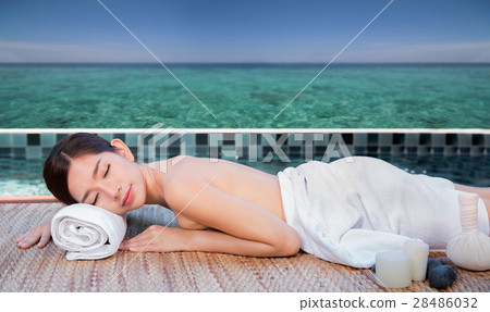 Sea and spa turquoise beach chiropractic massage therapy woman 28486032