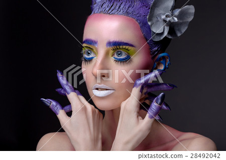 Creative portrait of woman with art make-up. Creative portrait of woman with art make-up. 28492042