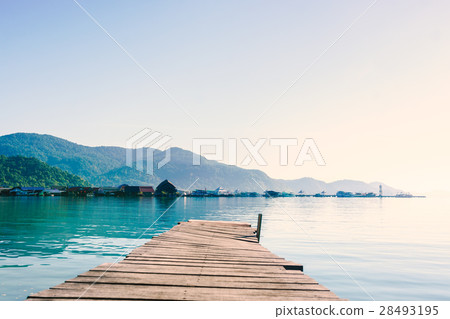 scenic view of the harbour with mountain 28493195