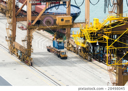 Container Cargo freight ship with working crane Container Cargo freight ship with working crane 28498045