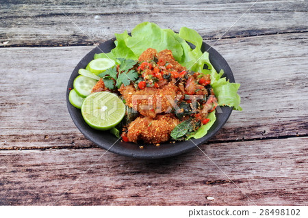 Spicy sour fried chicken salad call Yum Kai Zap Spicy sour fried chicken salad call Yum Kai Zap 28498102