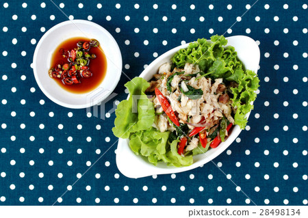 Stir -fried spicy basil with crab and spicy sauce. Stir -fried spicy basil with crab and spicy sauce. 28498134