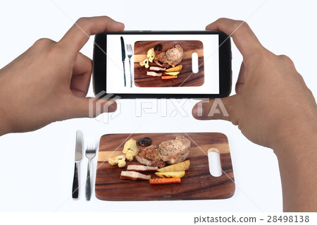 Take photo pork steak with  vegetable for share. 28498138