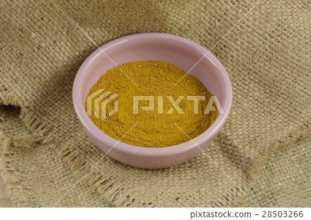 Bowl of ground Madras hot curry spice in bowl Bowl of ground Madras hot curry spice in bowl 28503266