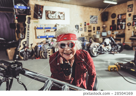 Outgoing female retiree locating on bike 28504169